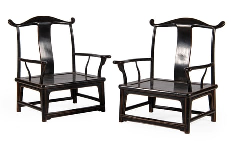 A Pair of Chinese Ebonized Ming Style Armchairs