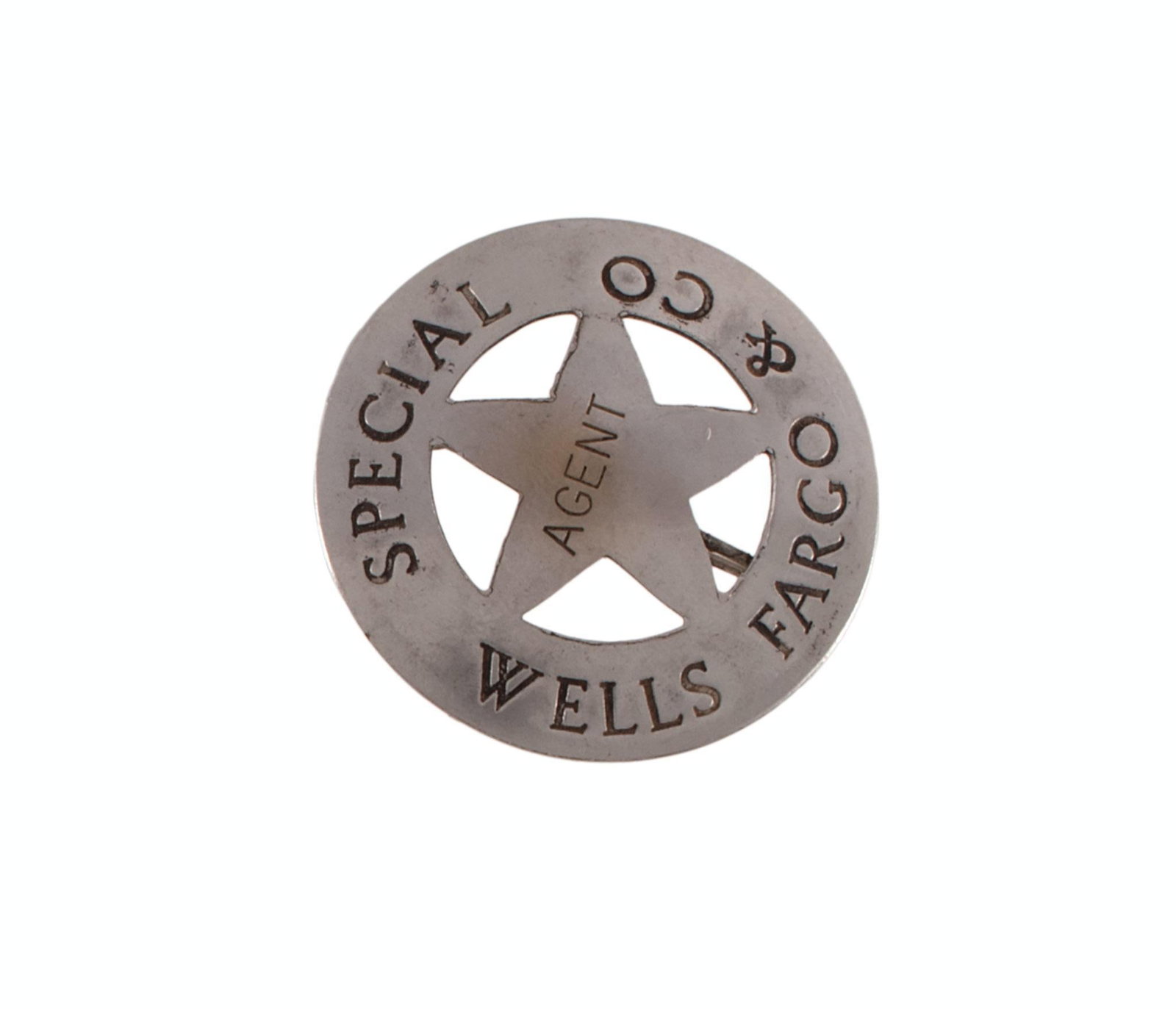 Obsolete Wells Fargo & Co. Special Agent Badge: Nice obsolete round Wells Fargo & Company Special Agent Badge. Badge is in good condition with pinback and some surface wear. Back is unmarked. It measures approximately 1-1/2" in diameter. Overal