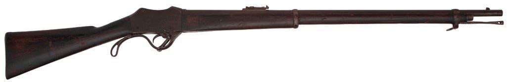 Nepalese Gahendra Rifle: .450/.577 caliber, 33.25" barrel, NSN. Blued finish with military stock retained by two barrel bands. Blade front sight with elevator rear sight. Top of receiver marked with Nepalese markings and date