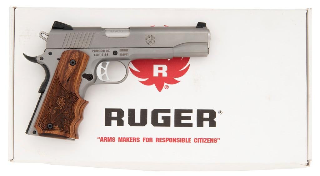 *Ruger .45ACP Model SR1911 Pistol with Soft Case & Box: .45ACP, 5" Barrel, S/N: 670-13108. Ruger SR1911 Semi-Automatic Pistol, Comes with one extra magazine, upgraded wood grips, and the soft case with box. **Gun, finish, magazines, grips, and case/box are