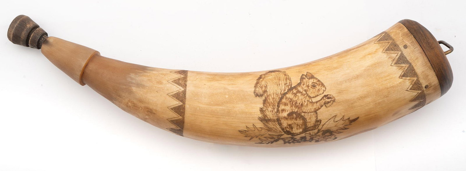 Contemporary Carved Powder Horn by Rick Frohelich: An excellent folk style body horn crafted by Rick Froehlich. Measuring 10.5" through the inside curve the horn proper features an engraved squirrel eating an acorn while sitting on some foliage. The b