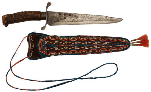 Hershel House (Kentucky, b . 1941) Woodbury Style Knife and Sheath: A Hershel House Woodbury style large knife and sheath, having a 7 1/2 inch tempered blade with steel "s" shaped handguard and deer crown handle, tang riveted down a coin silver end cap with engraved h