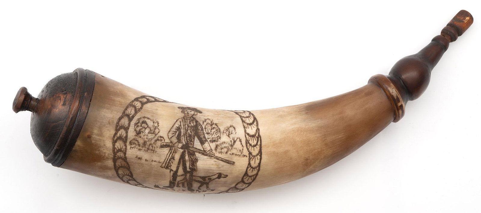 RICK FROEHLICH CONTEMPORARY SCRIMSHAW-DECORATED AND CARVED POWDER HORN Ca.2015: Folk style engraved powder horn by Rick Froehlich. The body of the horn with a wreath style floral engraving border of a hunter holding a fowling piece in front of hunting dog. Brushes and trees in th
