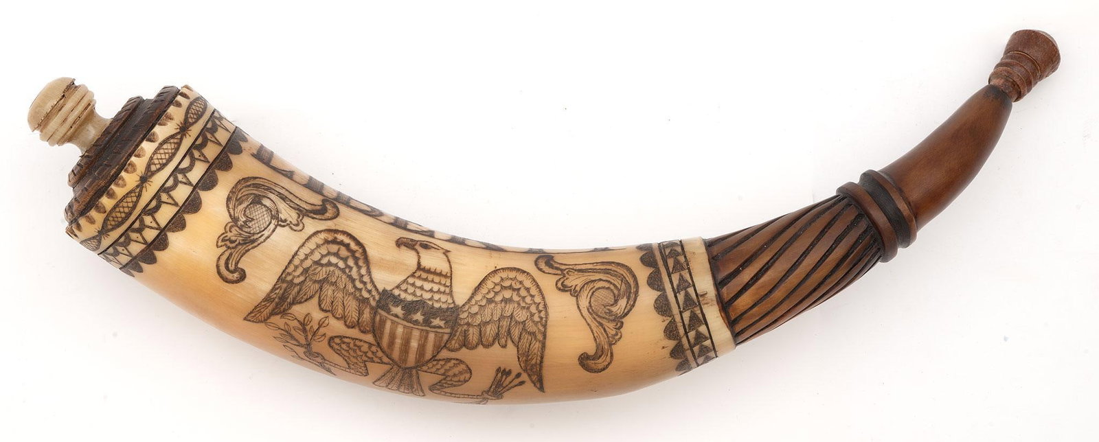 RICK FROEHLICH CONTEMPORARY SCRIMSHAW-DECORATED AND CARVED POWDER HORN Liberty Ca. 2013: A patriotic engraved contemporary powder horn by Rick Froehlich dated 2013. The horn proper engraved in large letters and border "Liberty". Just below that is an engraved patriotic eagle with US shiel