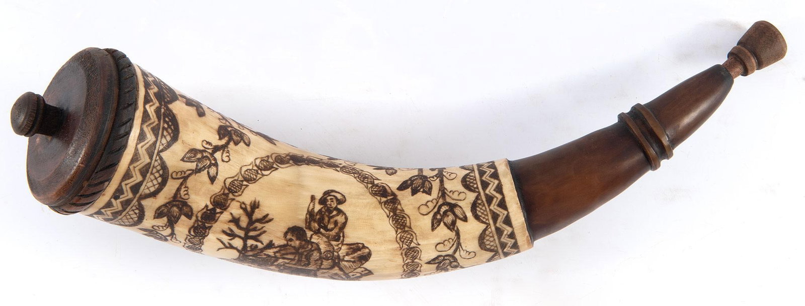 RICK FROEHLICH CONTEMPORARY SCRIMSHAW-DECORATED AND CARVED POWDER HORN Ca. 2015: A large and very detailed contemporary engraved powder horn by Rick Froehlich. Measuring at 13" through the inside curve. The horn proper with a engraved scene of a husband and wife sitting on a broke