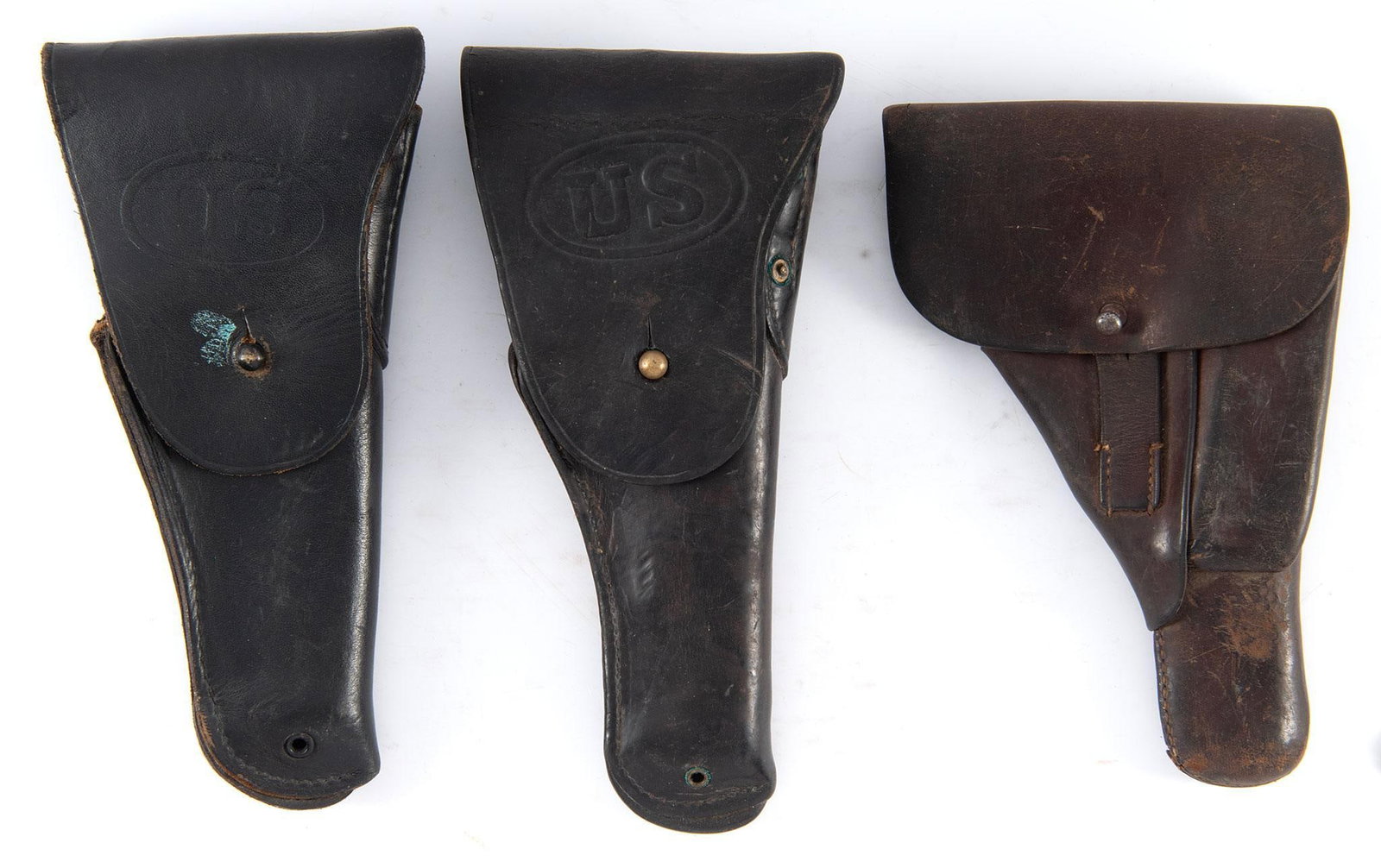 WWII Leather Pistol Holsters: Lot consists of three WWII leather pistol holsters, including a single German leather Mauser holster plus two US stamped Bolen Leather Colt 1911 holsters. Overall fair to good condition.