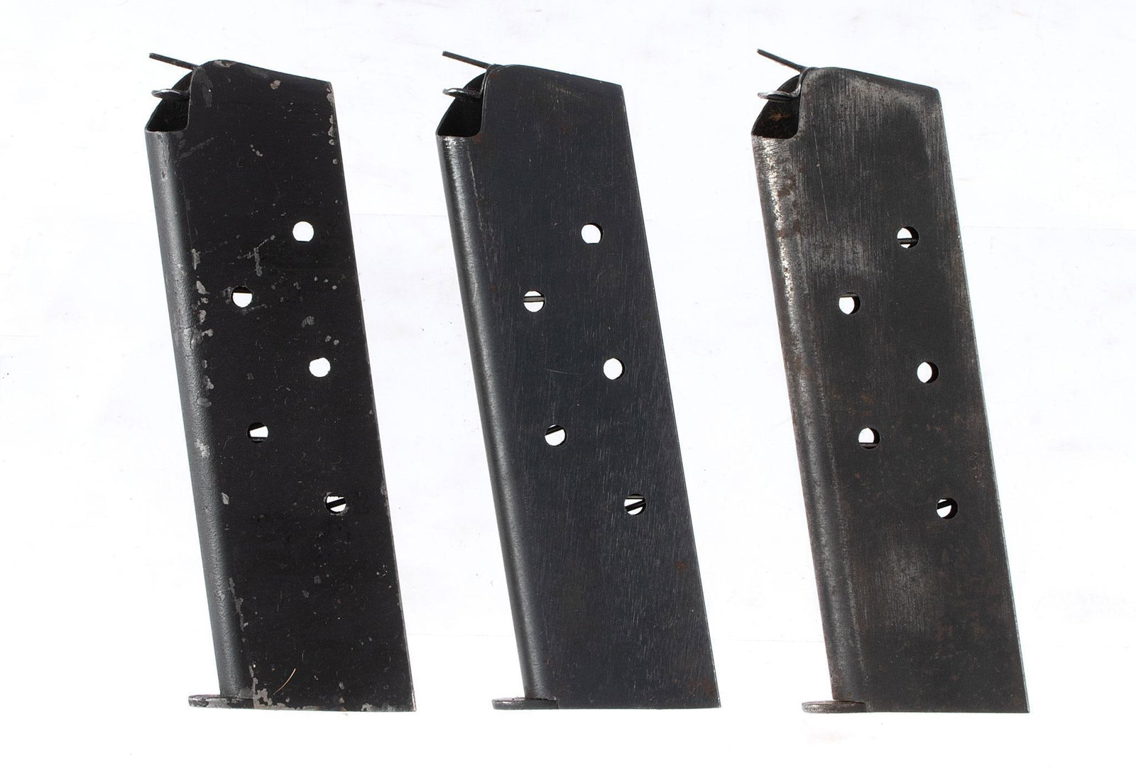 A Group of 1911 Pistol Magazines: 3 marked magazines with markings on the bottom including C-S and C-R. Surface rust on one, others in good condition.