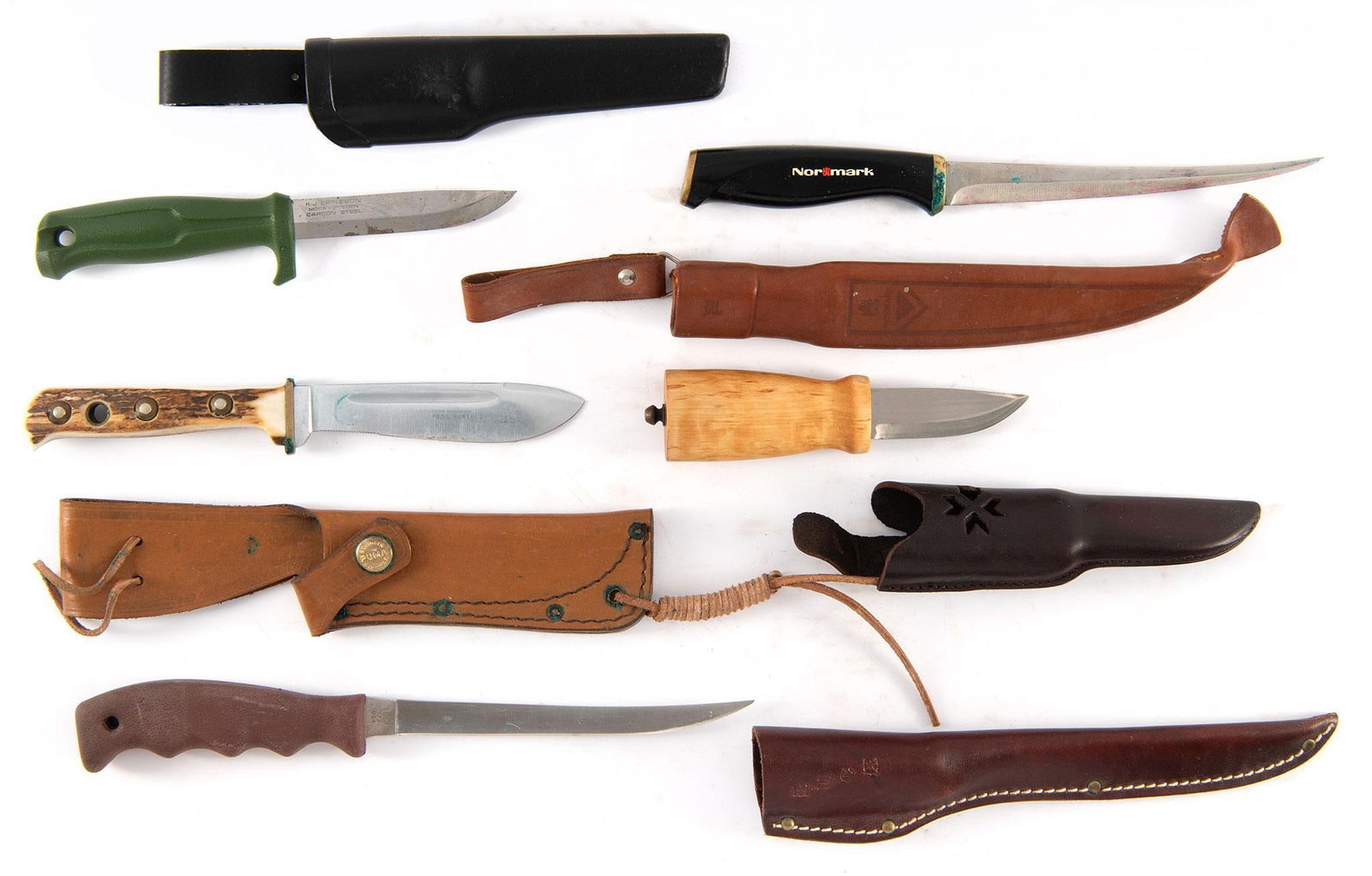 Group of Pocket Knives and Fishing Knives: Lot includes 7 fishing knives of various makers including Smith & Wesson, Buck, and Eriksson. Also includes 1 bone handed knife by Puma Hunter with sheath, blade measures 5 inches. Also includes 1