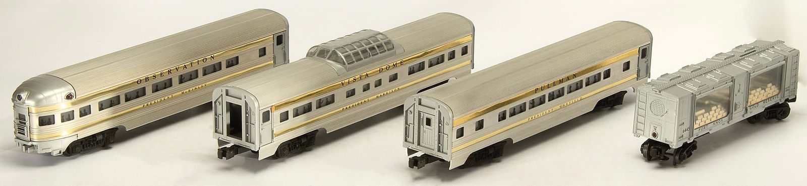 Vintage Lionel Toy Trains: Lot includes The Lionel Corporation Vista Dome Car #2522, Lionel Gold Stripe Presidential Car #2523, The Fort Knox Gold Bullion Transport Car #6445, and The Observation Car #2521. All in original boxe