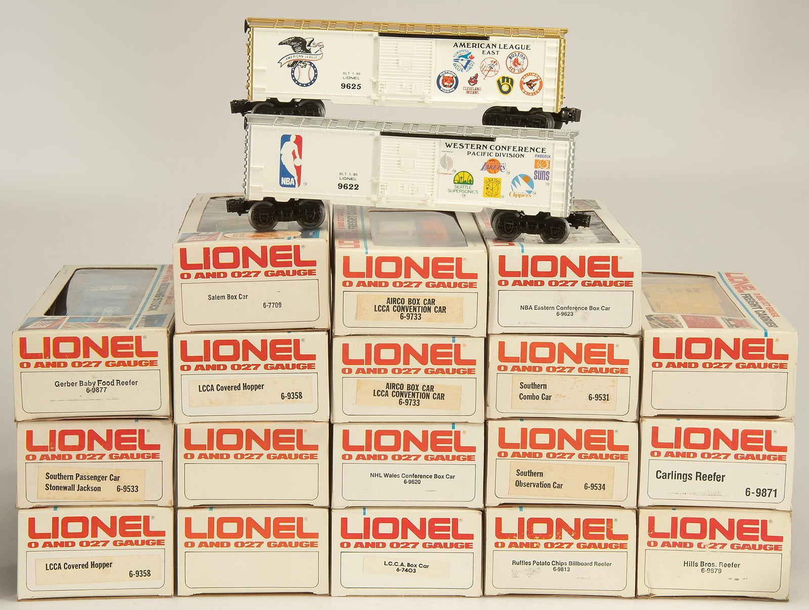 Lionel 0 & 27 Gauge Toy Trains: 20 boxes of Lionel 0 & 27 gauge toy trains, lot includes the Ruffles Potato Chips Billboard Reefer, Airco Box Car (2), NHL Wales Box Car, LCCA Box Car, Major League Baseball Box Car, NBA Eastern B