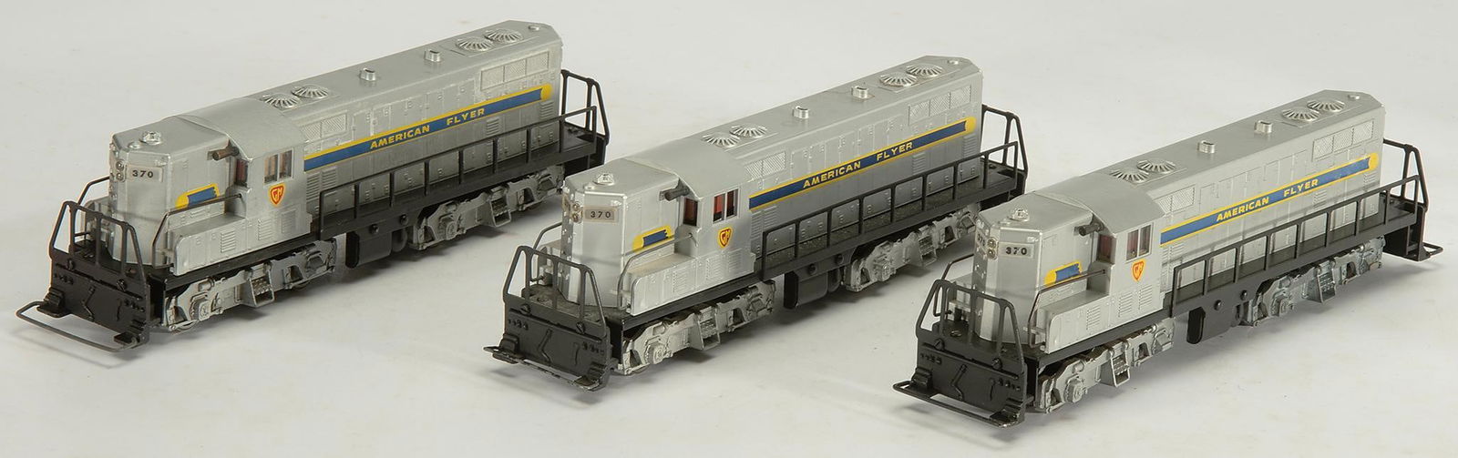 American Flyer 370 GP-7 Diesel Engines: Lot includes three total American Flyer S Guage #370 GP-7 Diesel Engines. Overall good condition. In A.C. Gilbert Co. Boxes with wrapping.