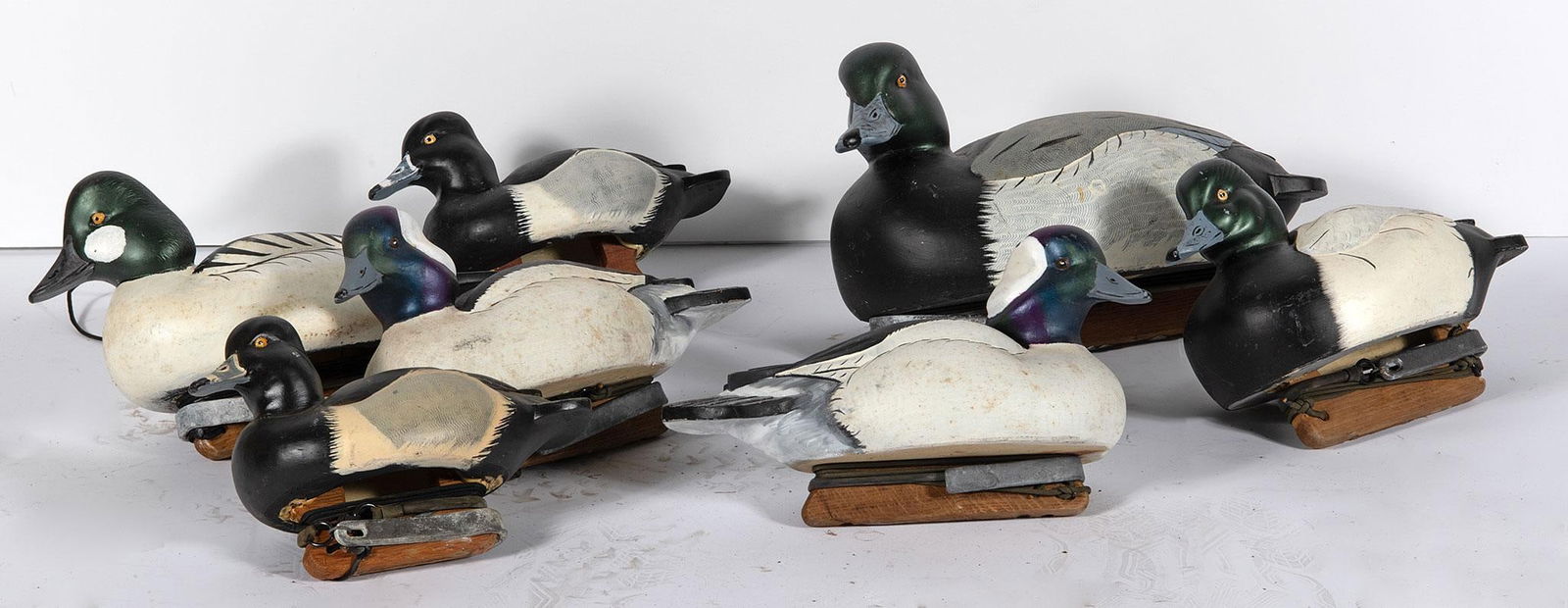 Grouping of Painted Poly-Foam Mallard Duck Decoys: A group of 7 painted poly-foam mallard duck decoys; largest ht. 10, wd. 19, dp. 9 inches. Good overall condition.