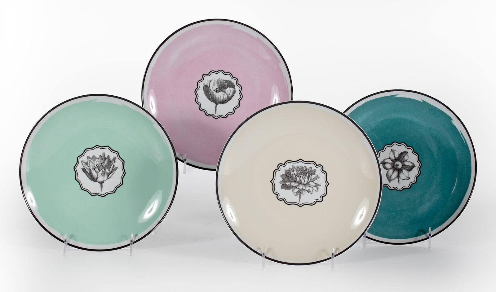 4 Christian Lacroix Dessert Plates: Lot includes four Christian Lacroix Maison Vista Alegre 1824 Herbariae dessert plates; dia. 9 inches. Overall very good condition.