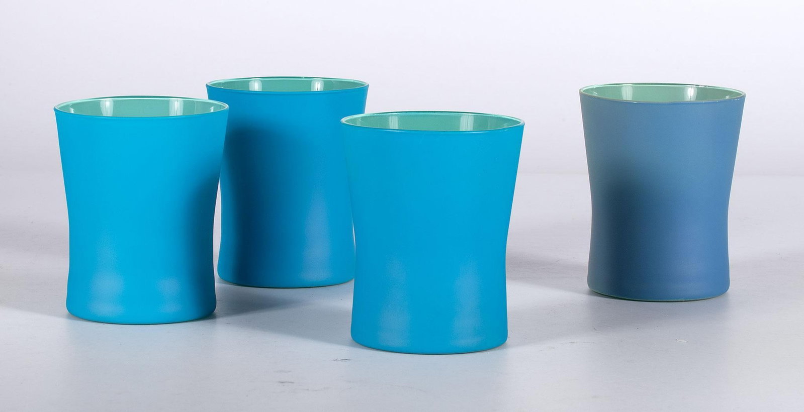 Set of Twelve Italian Vietri Tumblers: Lot includes a set of 12 Italian Vietri short tumbler glasses with mat green finish; ht. 4 x dia. 3.5 inches. Overall new in box.