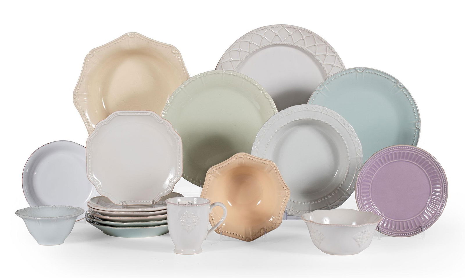 Large Grouping of Various Stoneware Dinnerware Pieces: Lot consists of 58 contemporary stoneware dinnerwares by Lenox, Skyros Designs, and Casalina. Lot includes large platters and centerpiece bowls, dinner plates, salad plates, dessert plates, bowls, and