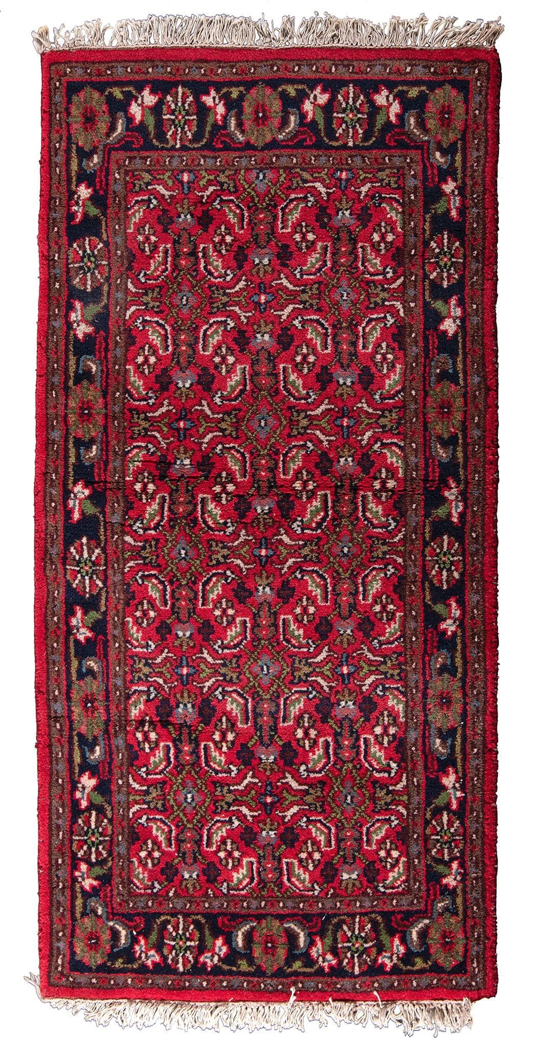 Lilihan Rug: Iran, 20th century. A lilihan area rug; 63 x 34 inches. Overall good condition.