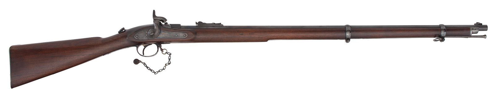 Outstanding Wesley Richards Monkey Tail Conversion Of Enfield Rifle: .450 bore diameter, 35" barrel, two barrel bands,the barrel with Whitworth style rifling. Military rear barrel sight, blade front sight. Marked on the lockplate Westley Richards & Co and dated 186