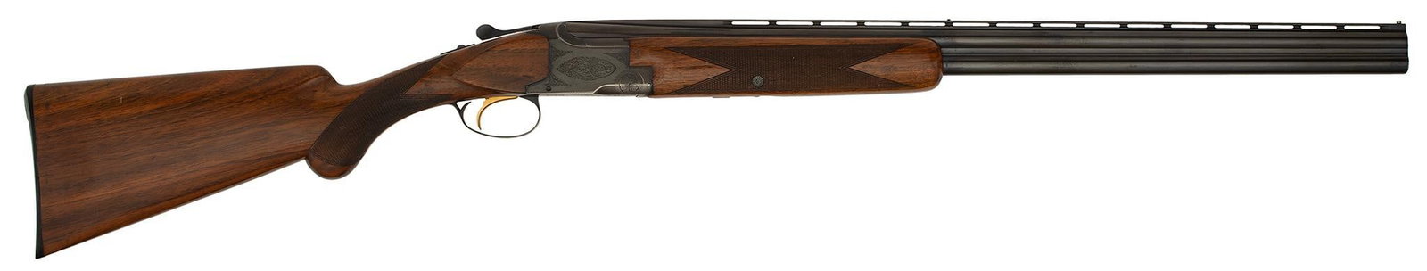 ** Browning Belgium Superpose Lightening Over Under Shotgun: 20 gauge, 26" barrels, S/N 52204V8. Length of pull 13.5". Blued finish with checkered beavertail forarm and pistol grip. Silver bead front sight with vented rib. Standard ejectors with barrels marked 