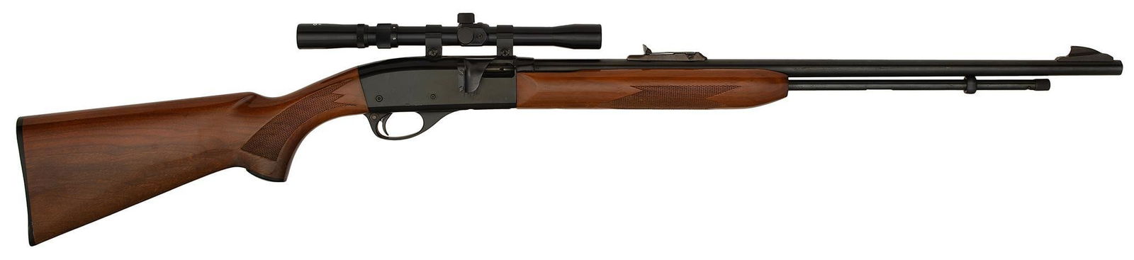 **Remington Speedmaster Model 552 Rifle: .22 caliber, 23.5" round barrel, S/N 207025. Blue finish, mounted with a Tasco scope. Overall in very good condition. Good bore, stock with typical nicks and scratches throughout.