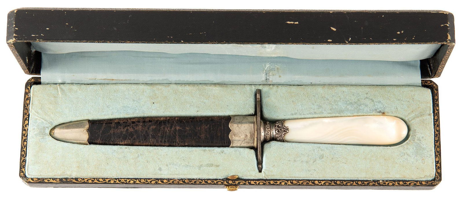 Contemporary Silver Star Saloon Cased Bowie Knife: 6.25" spear point blade, marked on the ricasso "Lasserr New Orleans". Silver guard and ferrule above the guard, pearl handle. Leather scabbard with silver tip and throat. Case in an old pebble