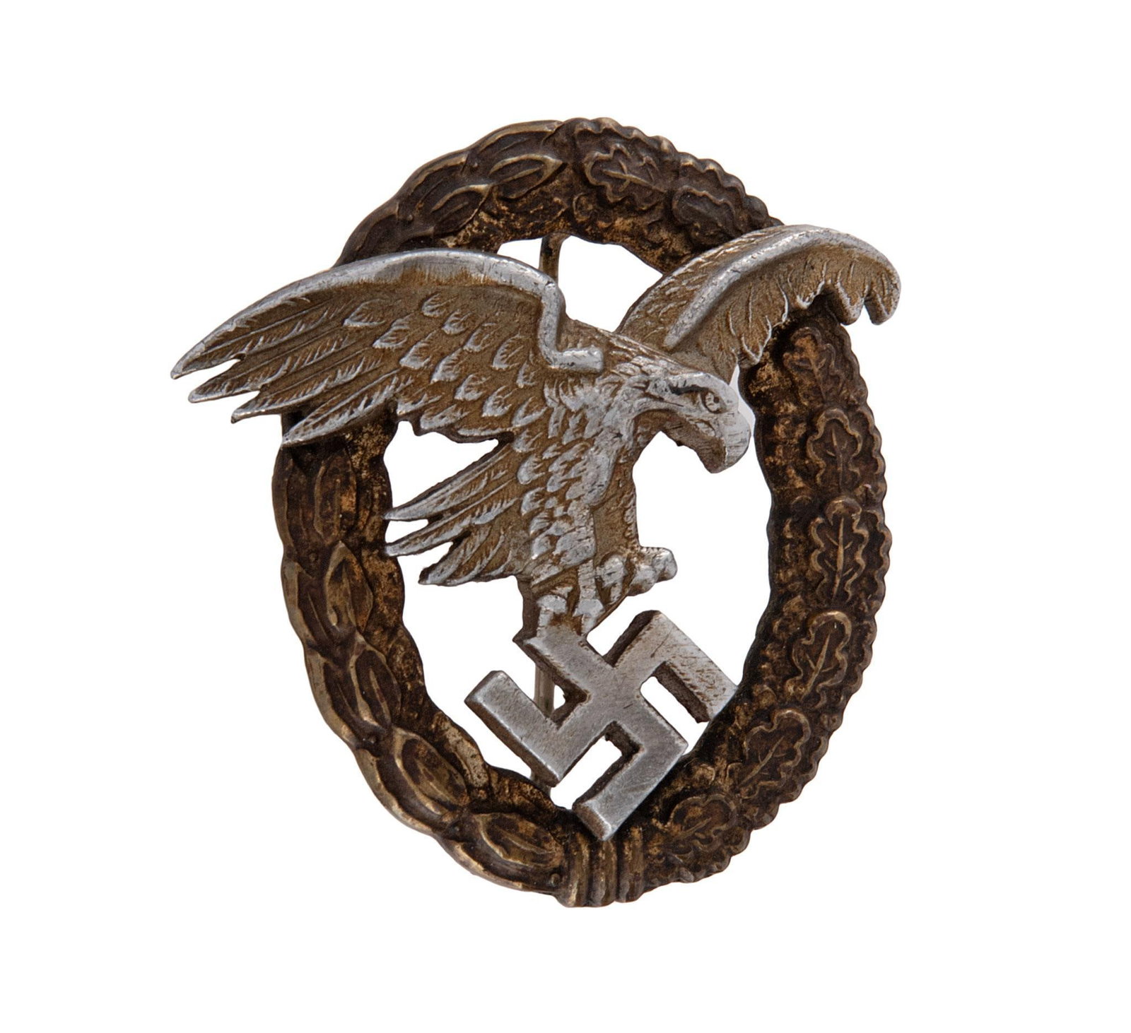 German WWII Luftwaffe Observer Badge: Lot includes a German WWII Luftwaffe Observer Badge. Measures 2 1/16'' wide by 2 1/8'' tall. The front shows a Luftwaffe flying eagle clutching a swastika in his talons in the center. Both are