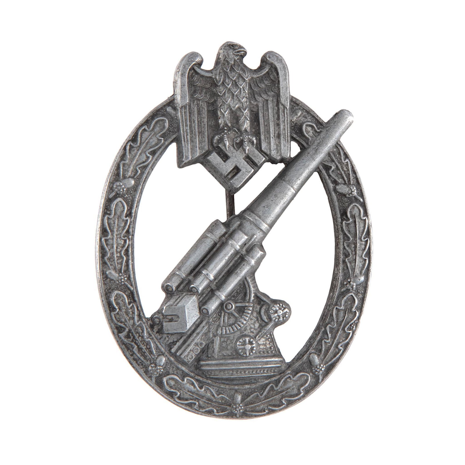 German WWII Army HEER Flak artillery Anti Aircraft Badge: Lot includes WWII Army HEER Flak Artilery Anti Aircraft Badge. Measures 1 3/4'' wide by 2 3/8'' tall. The front shows a flak 88 artillery gun in the center with a German eagle cluthcing a swastika in