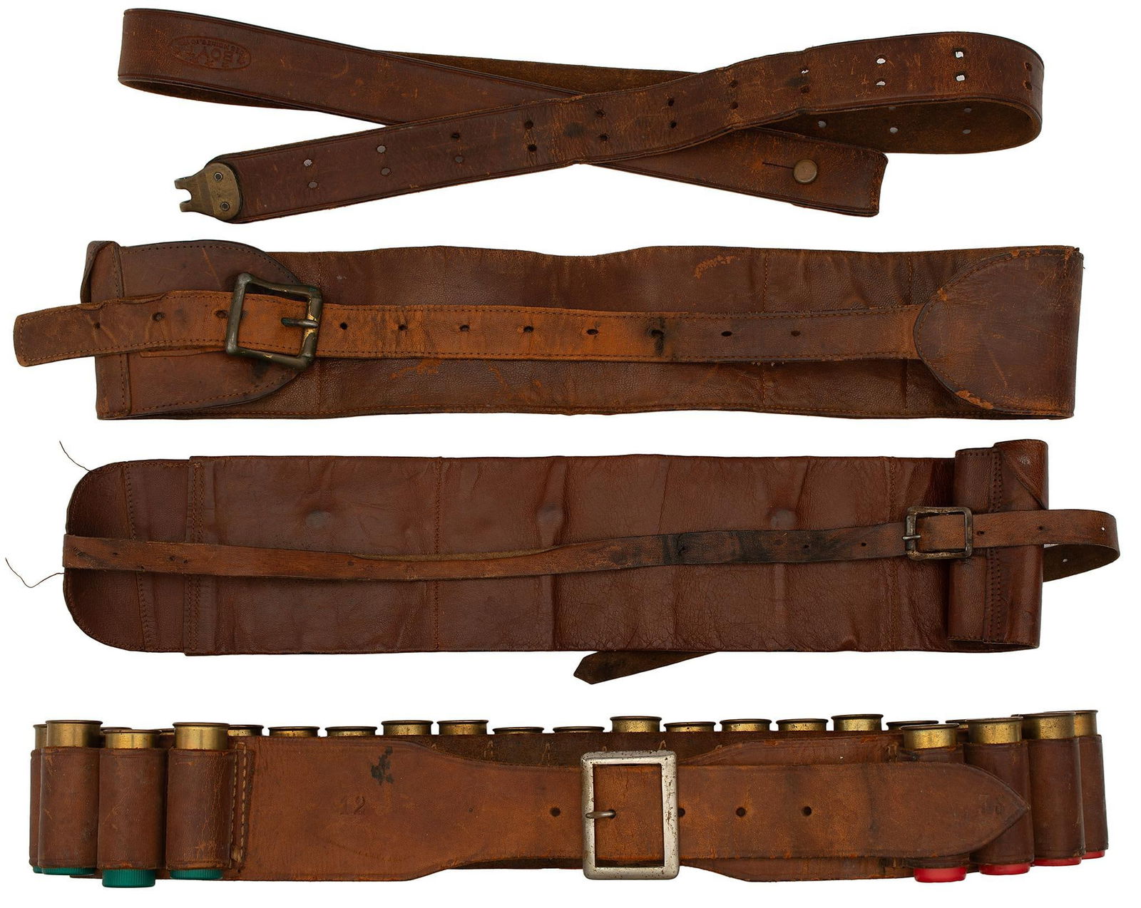 Grouping of Leather Cartridge Belts: Lot includes three antique leather cartridge belts and 1 rifle sling.