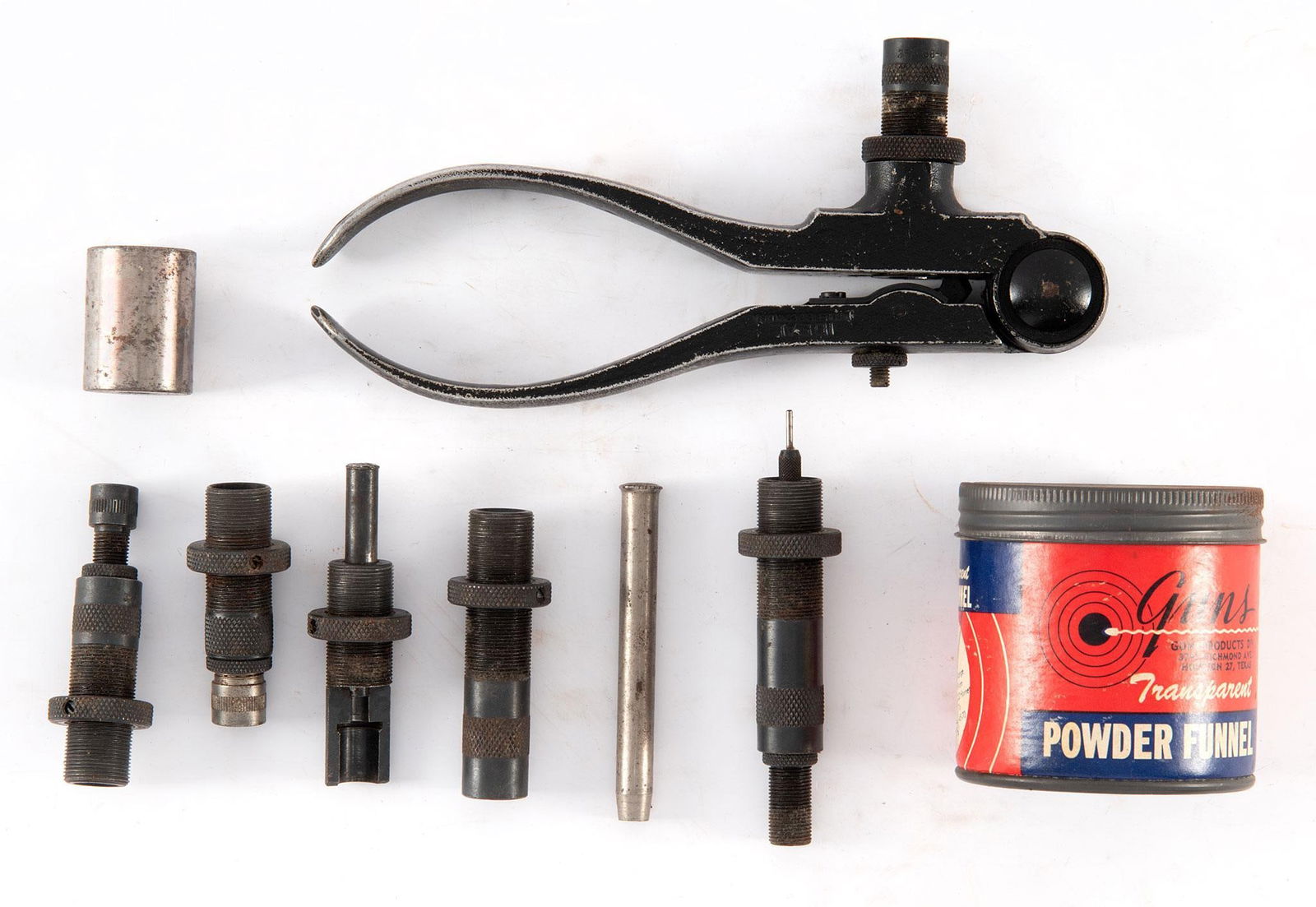 A Group of Reloading Supplies: Lot includes several vintage reloading tools such as; Ohaus 505 Loading Scale, Ideal Bullet mold with several dies, Ideal Reloading Melting pot, powder flask, antique spotting and Powder funnel. Overa