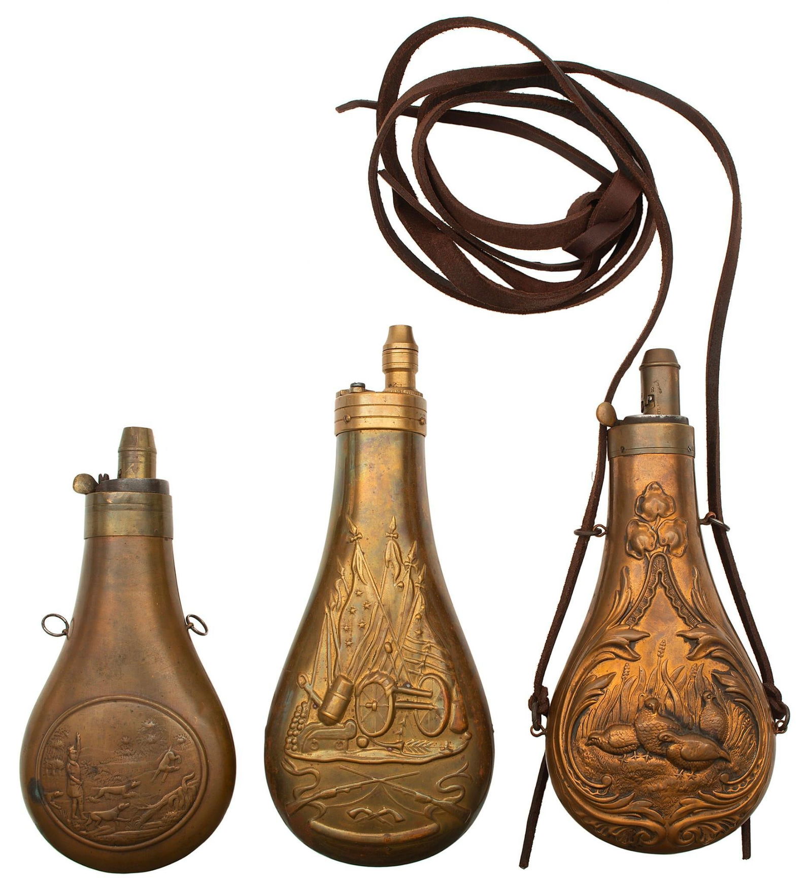 Lot of Three Powder Flasks: Large size antique powder flasks with four birds in a panel, the other side is plain. Medium size flask with bird dogs and a hunter working. A reproduction Colt walker flask. All in very good conditio