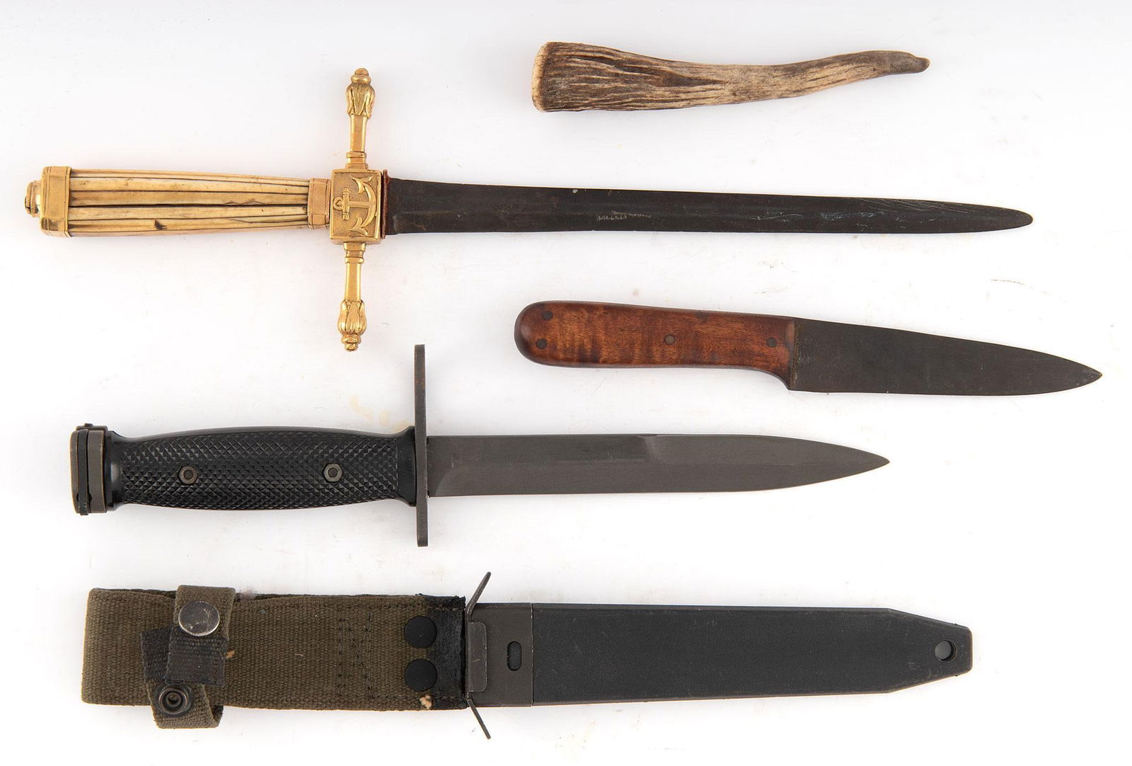 Group of Hunting Knives and Bayonet: Lot includes one (1) U.S. M7 bayonet, one (1) contemporary naval dagger with bone handle and naval markings, and one (1) hunting knife with wood handle. Longest measures 14.5 inches. Overall good cond
