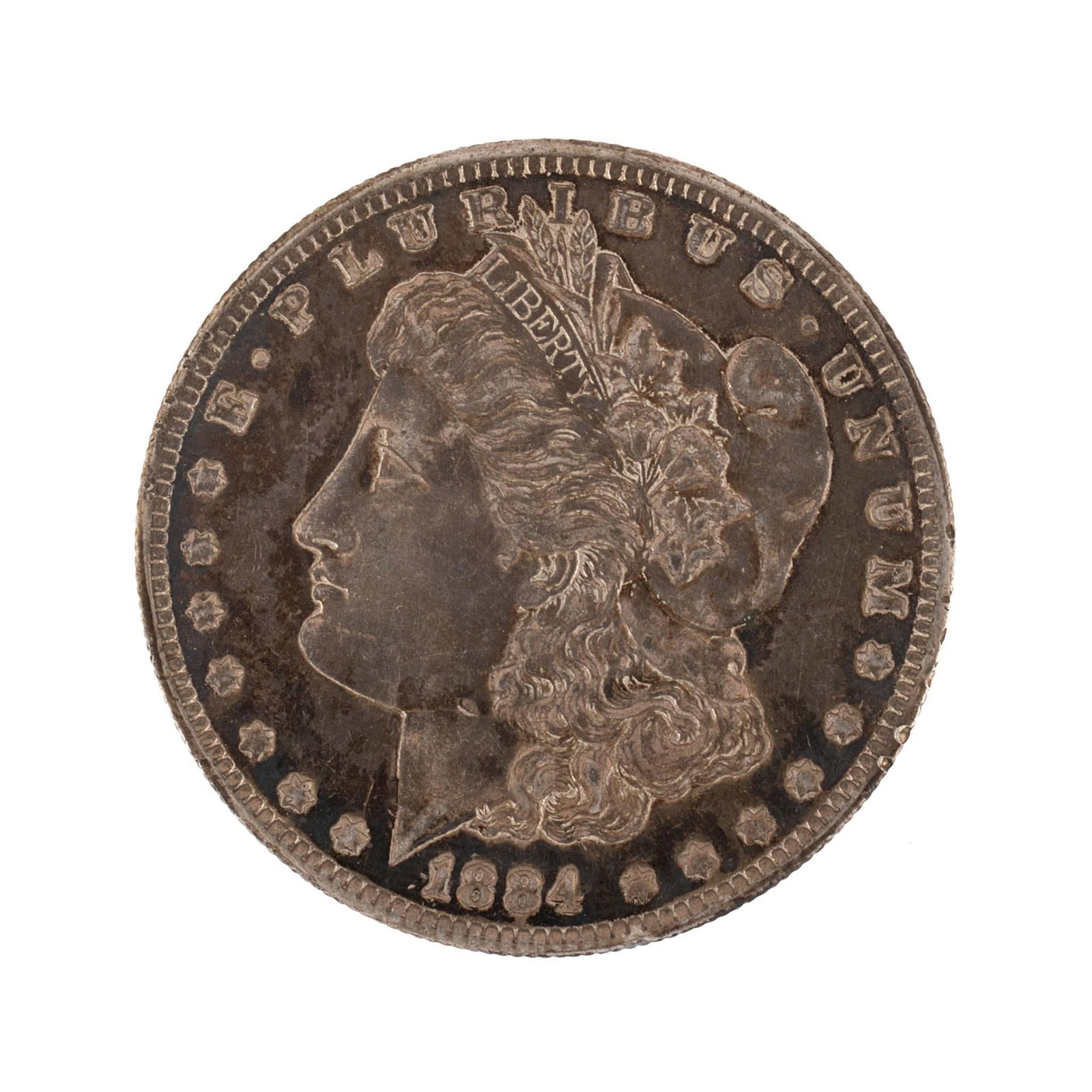 United States 1884-O Silver Morgan Dollar Coin: United States 1884-O silver Morgan dollar coin. Overall very high relief and very good condition minimal scratches. 27 grams.