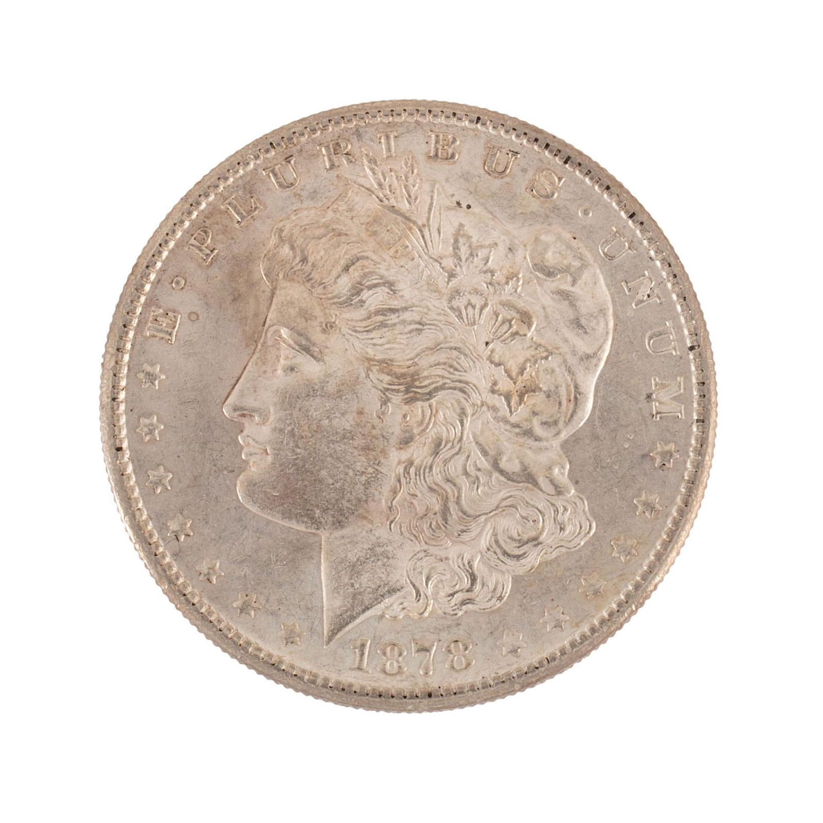 United States 1878-S Silver Morgan Dollar Coin: United States 1878-S silver Morgan dollar coin. Overall very high relief and very good condition minimal scratches. 27 grams.