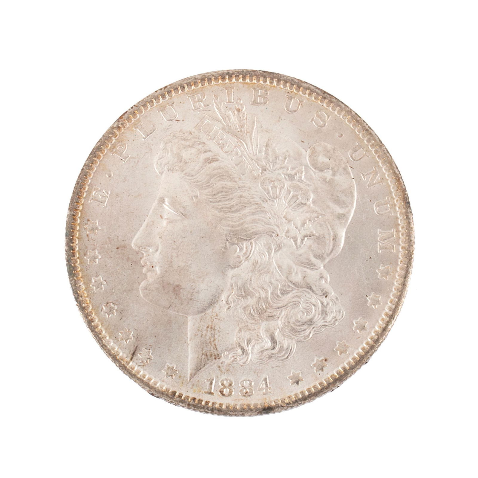 United States 1884-O Silver Morgan Dollar Coin: United States 1884-O silver Morgan dollar coin. Overall very high relief and very good condition minimal scratches. 27 grams.