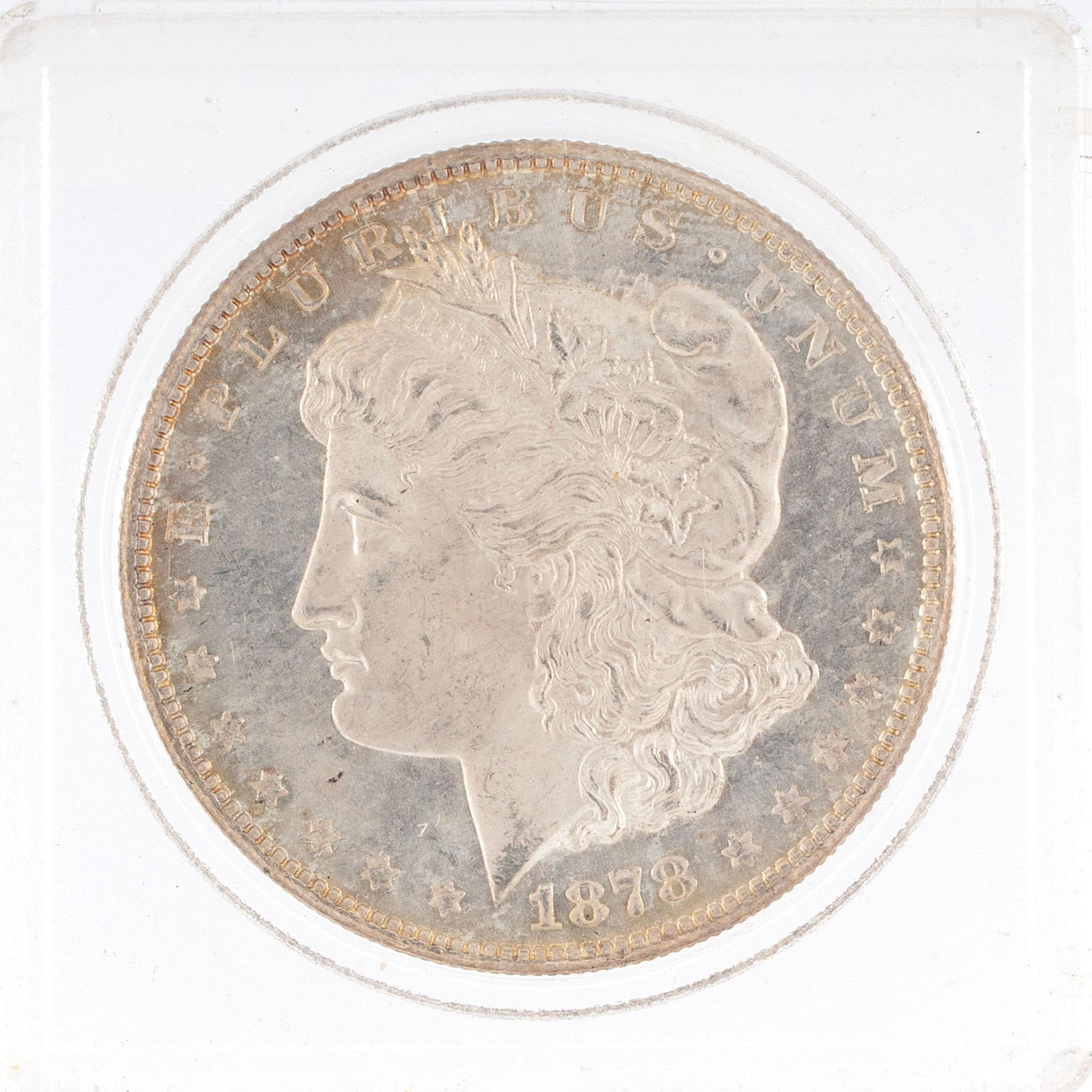 United States 1878 United States Silver Dollar Coin: A United States 1878-S silver Morgan dollar coin ungraded in case. Very good condition.