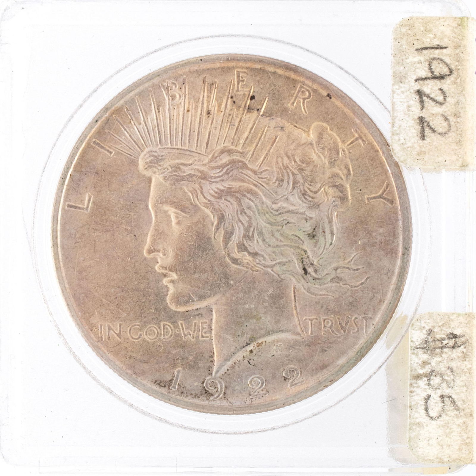 United States 1922 Silver Peace Dollar Coin: A United States 1922 silver Peace dollar ungraded coin in case. Very good condition.