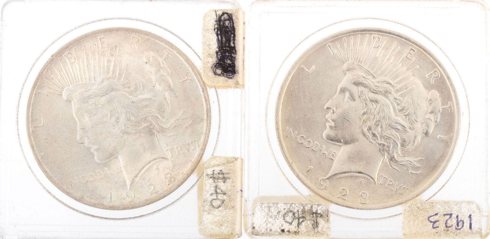 Two 1923 United States Silver Peace Dollar Coins: Two United States 1923 silver Peace dollar ungraded coins in case. Very good condition.