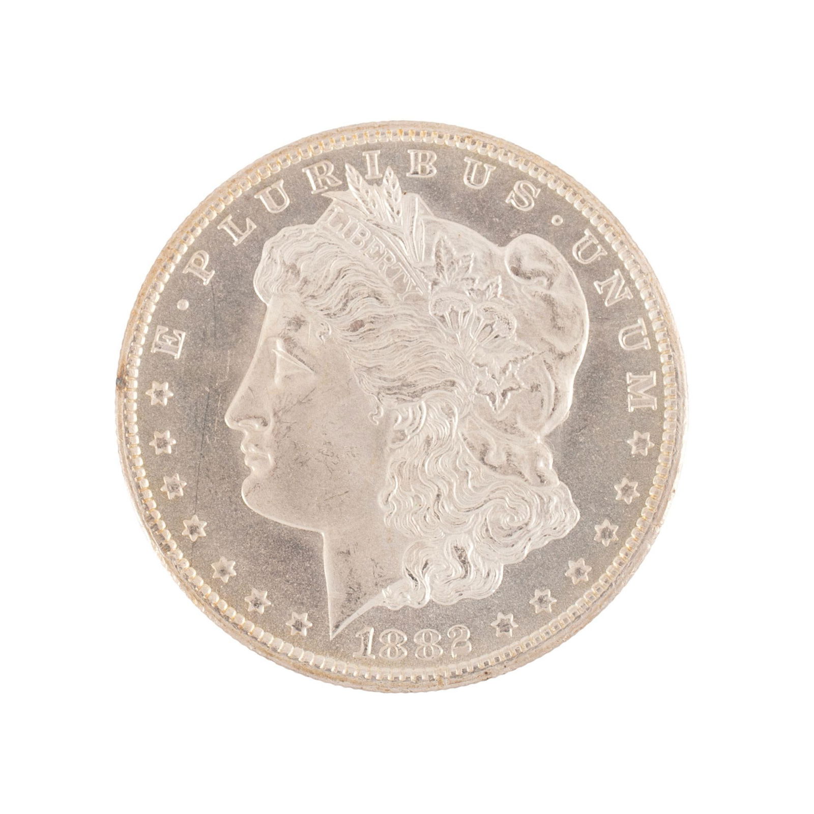 United States 1882 Carson City Silver Morgan Dollar Coin: United States 1882 Carson City silver Morgan dollar coin. Overall very high relief and very good condition. 27 grams.