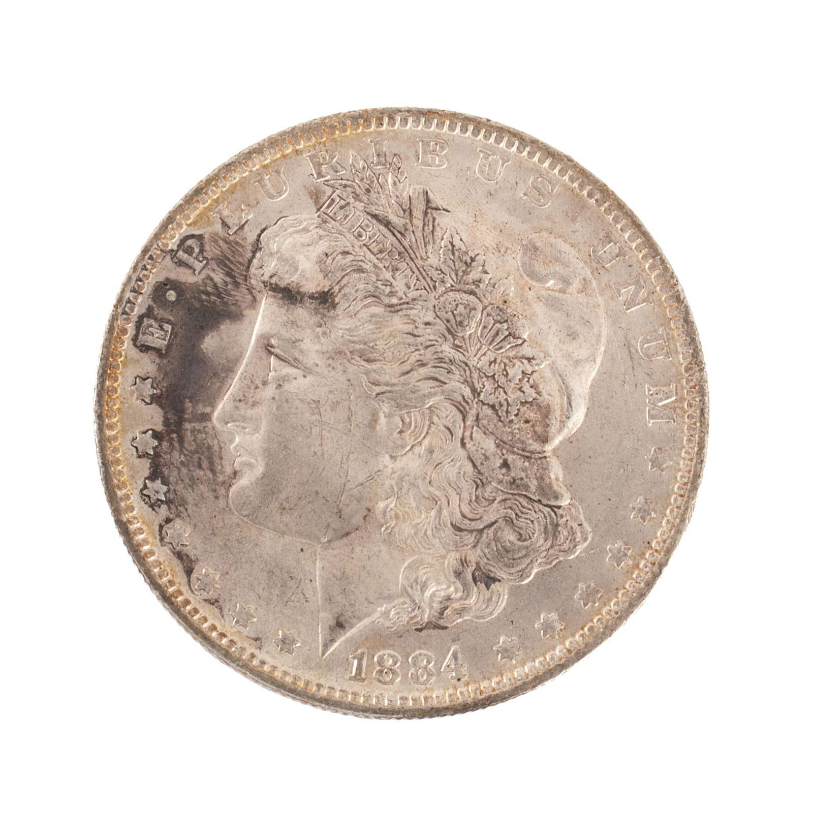 United States 1884-O Silver Morgan Dollar Coin: United States 1884-O silver Morgan dollar coin. Overall high relief and good condition minimal scratches. 27 grams.
