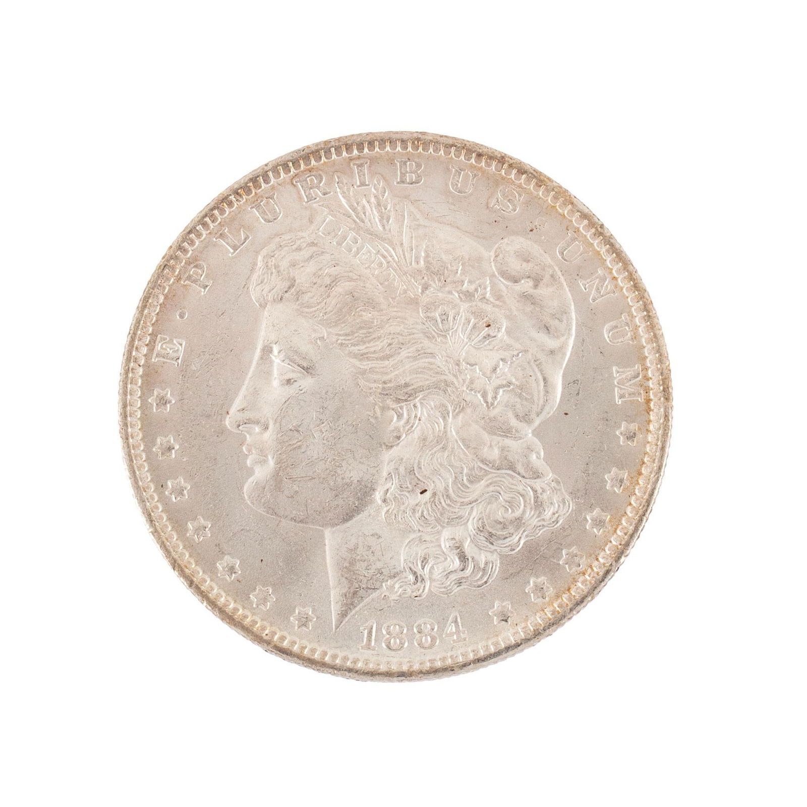 United States 1884-O Silver Morgan Dollar Coin: United States 1884-O silver Morgan dollar coin. Overall very high relief and very good condition minimal scratches. 27 grams.