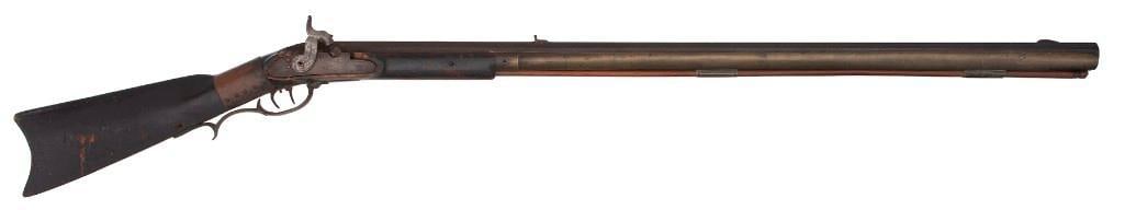 Pennsylvania Fullstock Percussion Rifle: .50 caliber, 34" octagonal barrel, NSN. Notched rear sight with a brass blade front sight. Half stock with the forend wrapped in brass, with engraved lines running to the tip. Brass triggerguard with