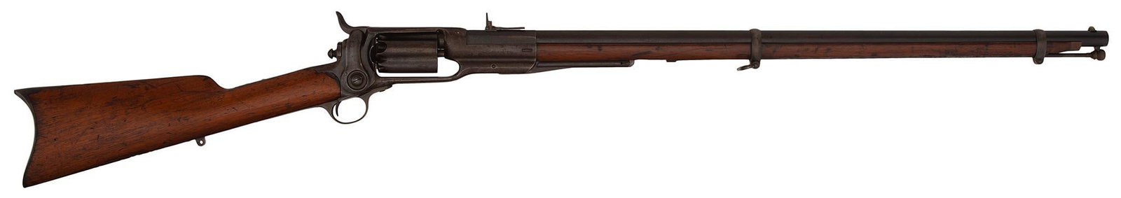 Colt Model 1855 Percussion Military Revolving Rifle: 56 caliber, 31" barrel, S/N 2920. Three leaf rear barrel sight, blade front sight. Blue finish, walnut stock and forearm. Brass nosecap, brass tip ramrod. Marked in the groove on top of the frame Col 