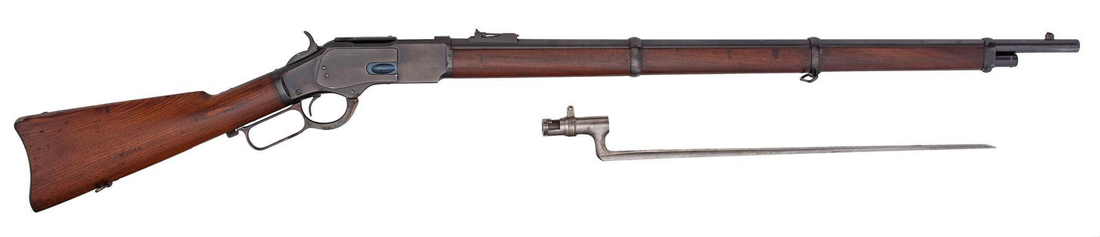 Winchester Model 1873 Lever Action Musket: 44 W.C.F. caliber, 30" barrel, S/N 569960B. Walnut buttstock with a walnut three-band forearm, and the proper Winchester angular bayonet. This musket retains most of the original blue finish with