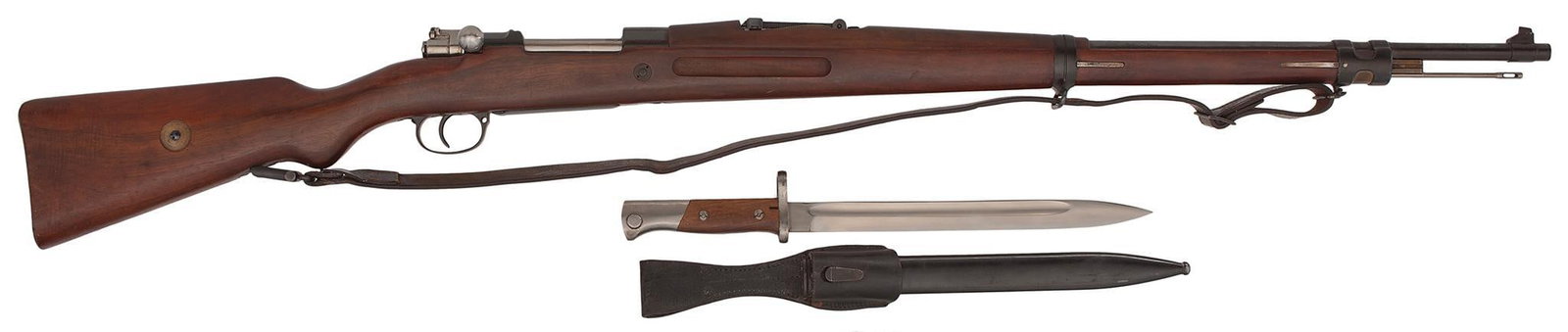 **Mauser Model 98 Rifle Brazilian Contract: 7.57 caliber, 30" barrel, S/N 6265. Blue finish, walnut stock and handguard. With a matching bayonet. This rifle has all of the bright blue finish. Beautiful Brazilian crest on the top of the receiver