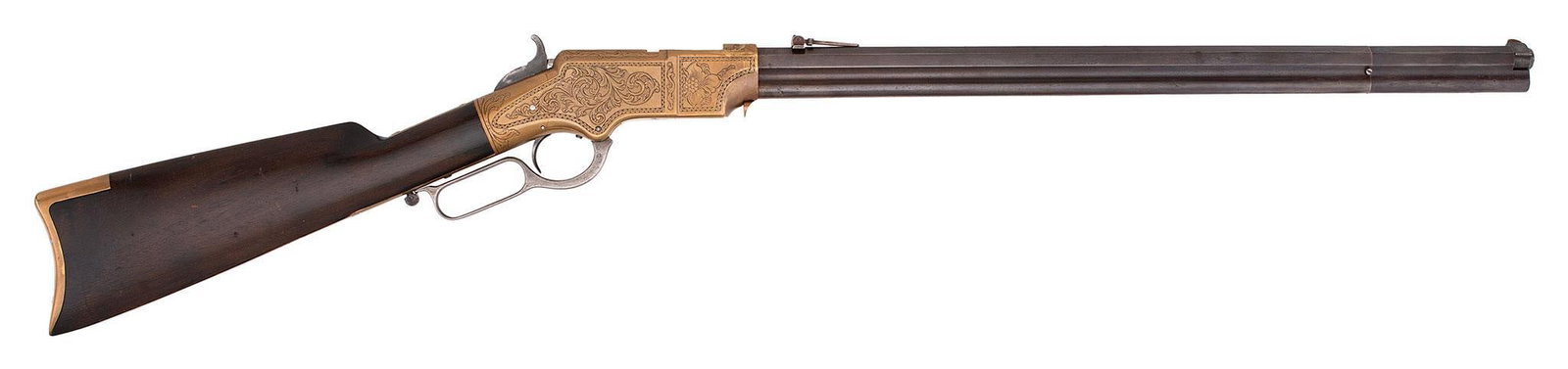 Engraved Henry Rifle: 44 RF caliber, 23" barrel, S/N 3378. Has an original 900 yard rear barrel sight. Engraved by Samuel J Hoggson, the left side has standing stag with mixed floral designs and border designs. The barrel 