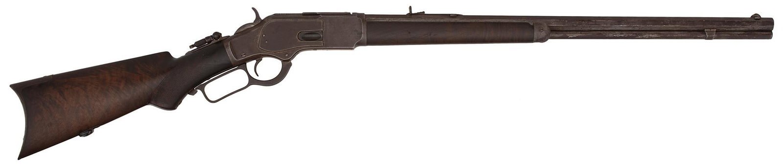 Winchester Model 1873 Deluxe Rifle: 32-20 caliber, 24" octagonal barrel, S/N 129344, deluxe checkered pistol grip stock. The forearm with fancy select walnut. This rifle appears to be a factory nickel rifle. Most of the metal has traces