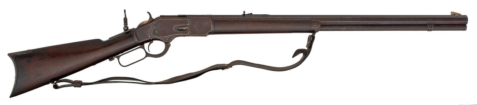 Rare Winchester Model 1873 Heavy Barrel Rifle: 44-40 caliber, 26" Heavy octagonal barrel with full magazine, S/N 81488. The barrel is 1.015" across the flats. Blue finish, with walnut stock and forearm. Rear tang sight, standard rear barrel sight 
