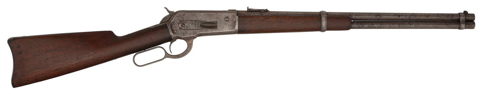 Winchester Model 1886 Lever Action SRC: .45-70 caliber, 22" barrel, S/N 120158. Blue barrel and case colored frame. Original front and rear sights. This carbine is sharp and crisp. All metal is gray to brown, mixed with some staining. **The