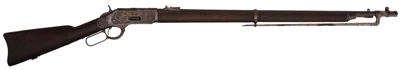 Winchester Model 1873 Musket With Bayonet: 44-40 caliber, 30" barrel, S/N 33744. Two bands, most of the metal is gray with brown staining. **The stock and forearm are dark with some nicks and dings. The bore is fair to good.