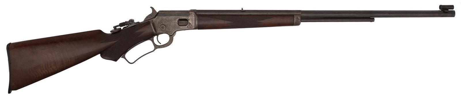 Rare Factory Engraved Deluxe Marlin Model 1891: 22 caliber, 24"Half octagonal to round barrel, half magazine, S/N 51785. Blue barrel with case colored frame and nosecap. Rear tang sight and front hood sight. Deluxe checkered forearm with checkered 