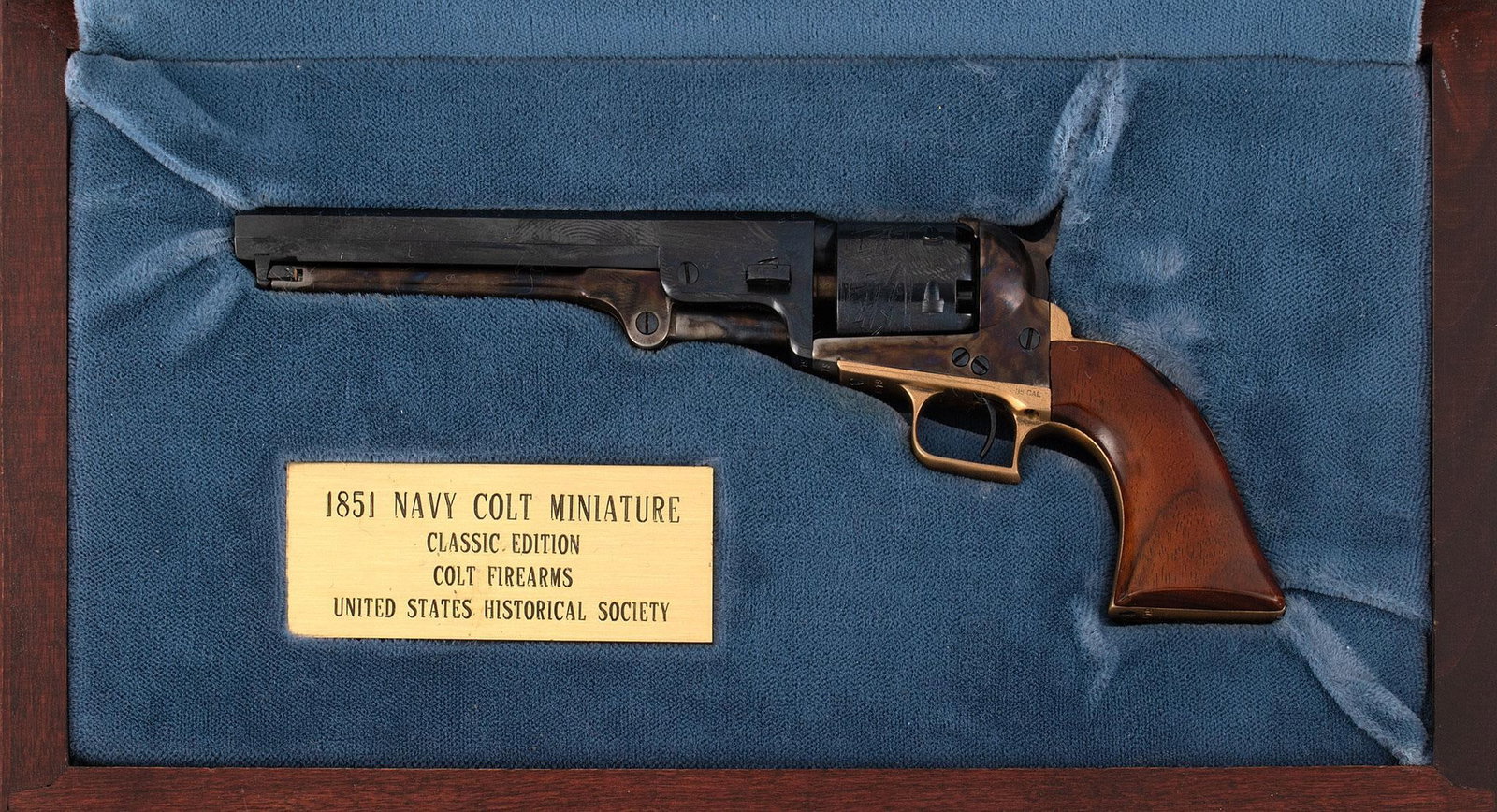 Miniature Colt 1851 Navy Percussion Revolver: S/N 619. One-third miniature of the Colt 1851 Navy revolver. Comes in fitted display case with plaque from U.S. Historical Society.